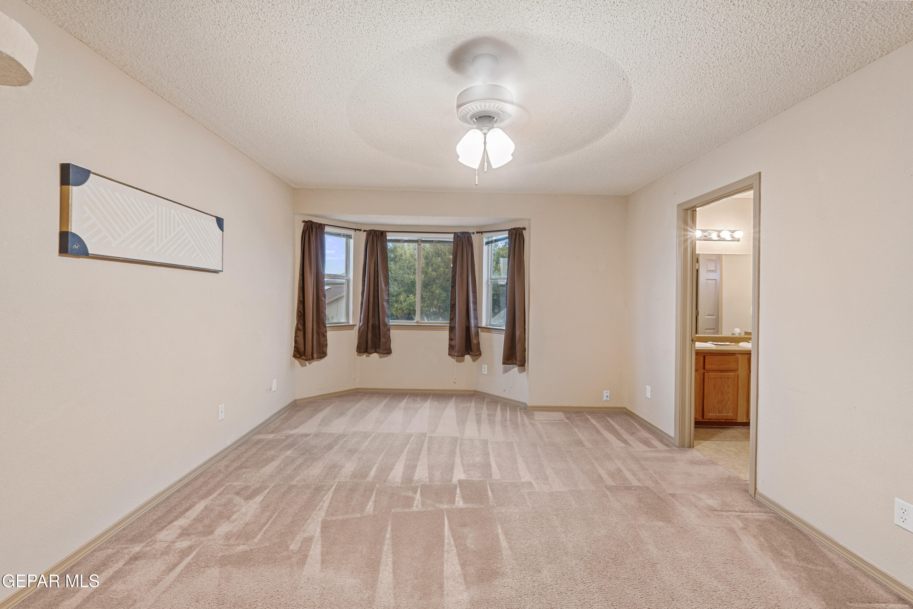 3849 Tierra Roca Place El Paso, TX 79938 - Photo 32 of 44 a view of an empty room with a window