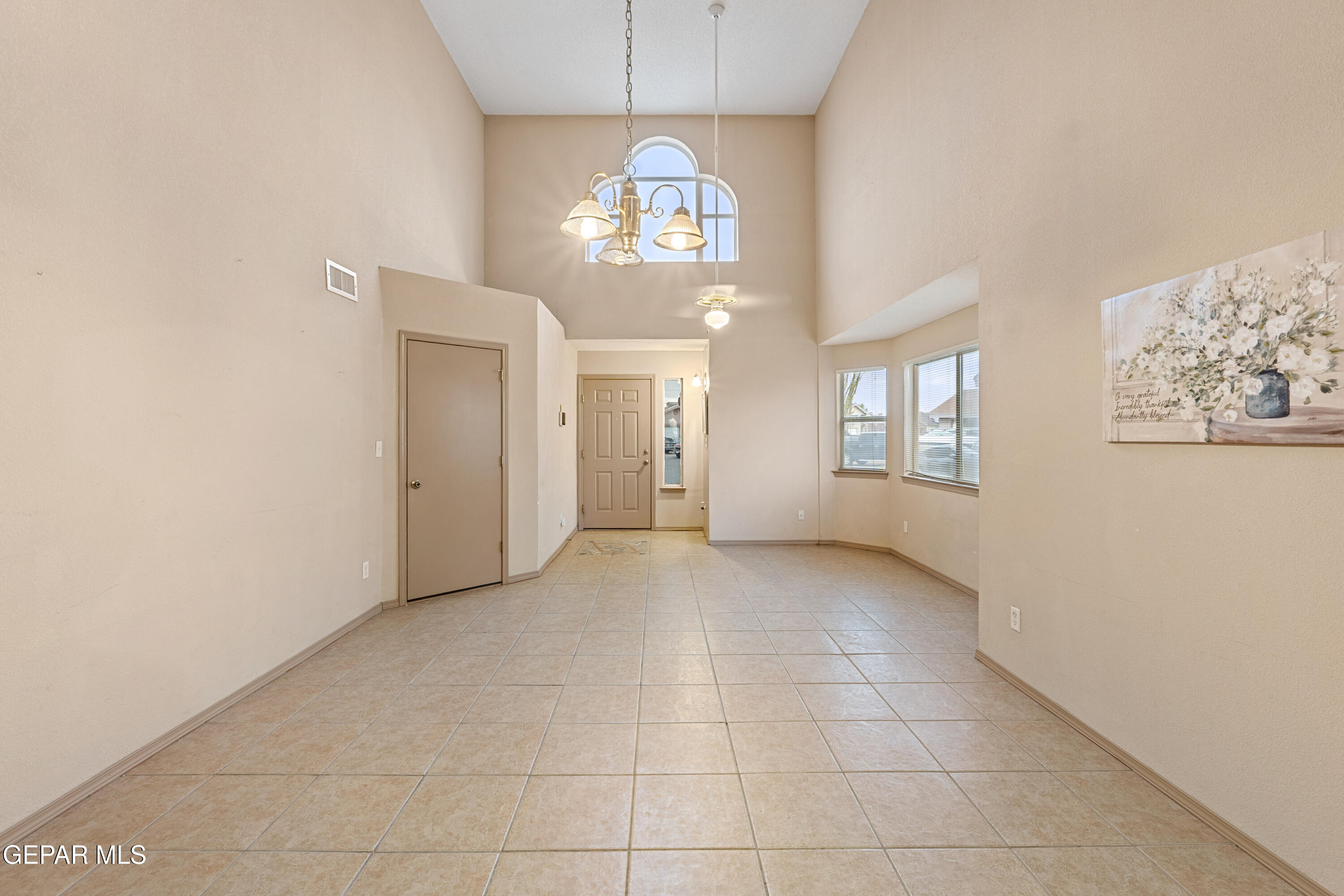 3849 Tierra Roca Place El Paso, TX 79938 - Photo 10 of 44 a view of an empty room with a window