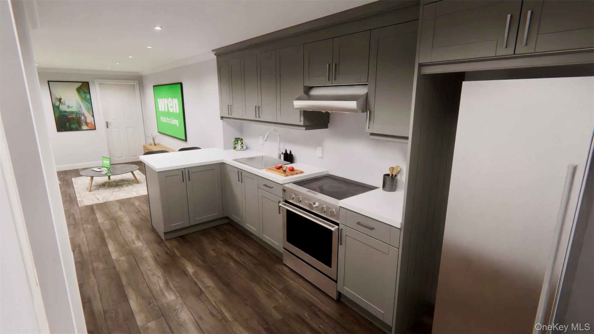 356 Main Street, Unit 1 Farmingdale, NY 11735 - Photo 3 of 4 a kitchen with stainless steel appliances a sink a stove a refrigerator and cabinets