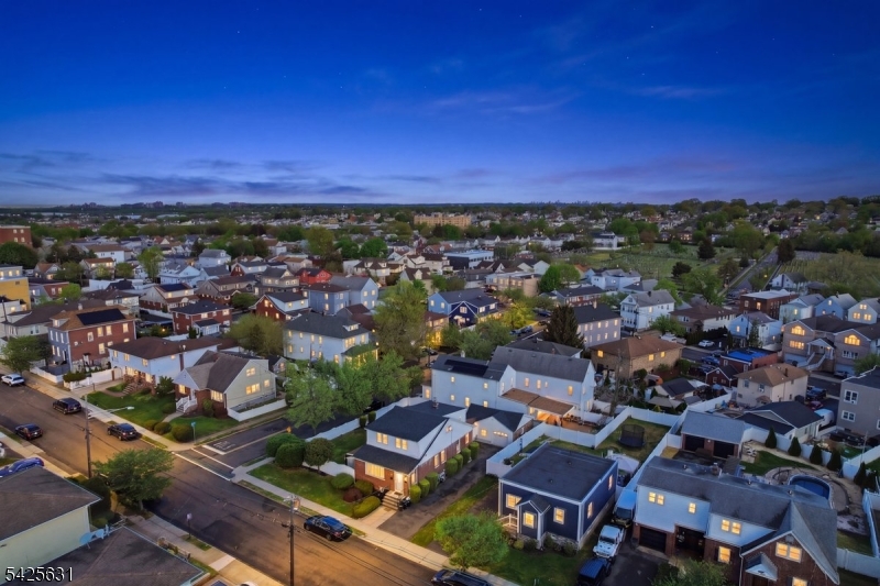 60 Westervelt Place Lodi, NJ 07644 - Photo 2 of 48 an aerial view of residential houses with outdoor space
