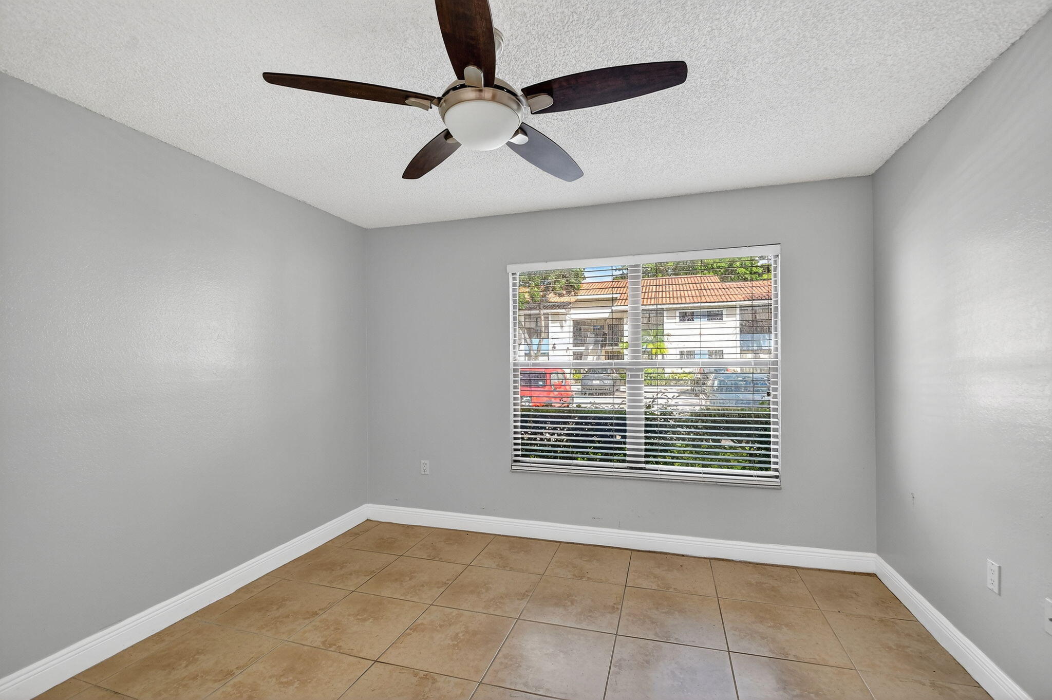 1601 Windorah Way, Unit D West Palm Beach, FL 33411 - Photo 36 of 41 a view of an empty room with a window