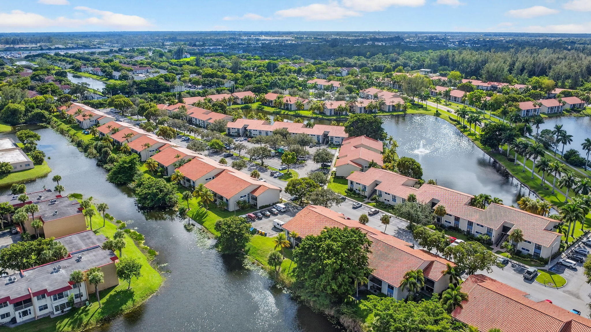 1601 Windorah Way, Unit D West Palm Beach, FL 33411 - Photo 4 of 41 an aerial view of residential houses with outdoor space