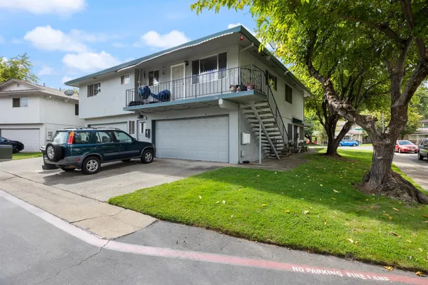 a car parked in front of a house