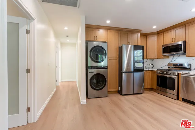 a view of kitchen and washer and dryer