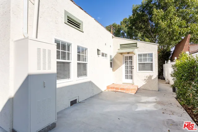 a front view of a house with a garage