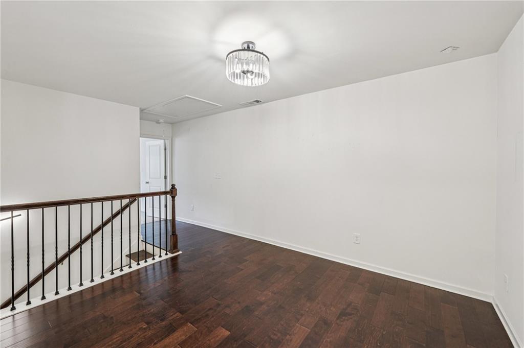 208 Trailside Way Hiram, GA 30141 - Photo 21 of 45 a view of a hallway with wooden floor
