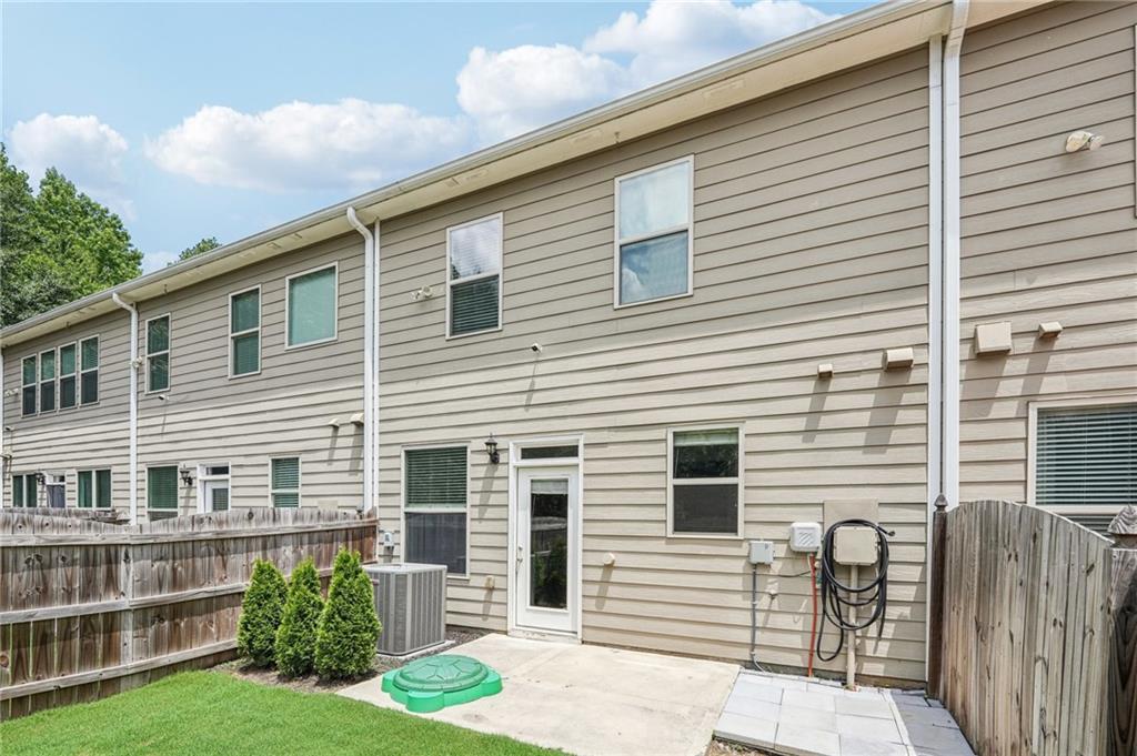 208 Trailside Way Hiram, GA 30141 - Photo 34 of 45 a front view of a house with a yard