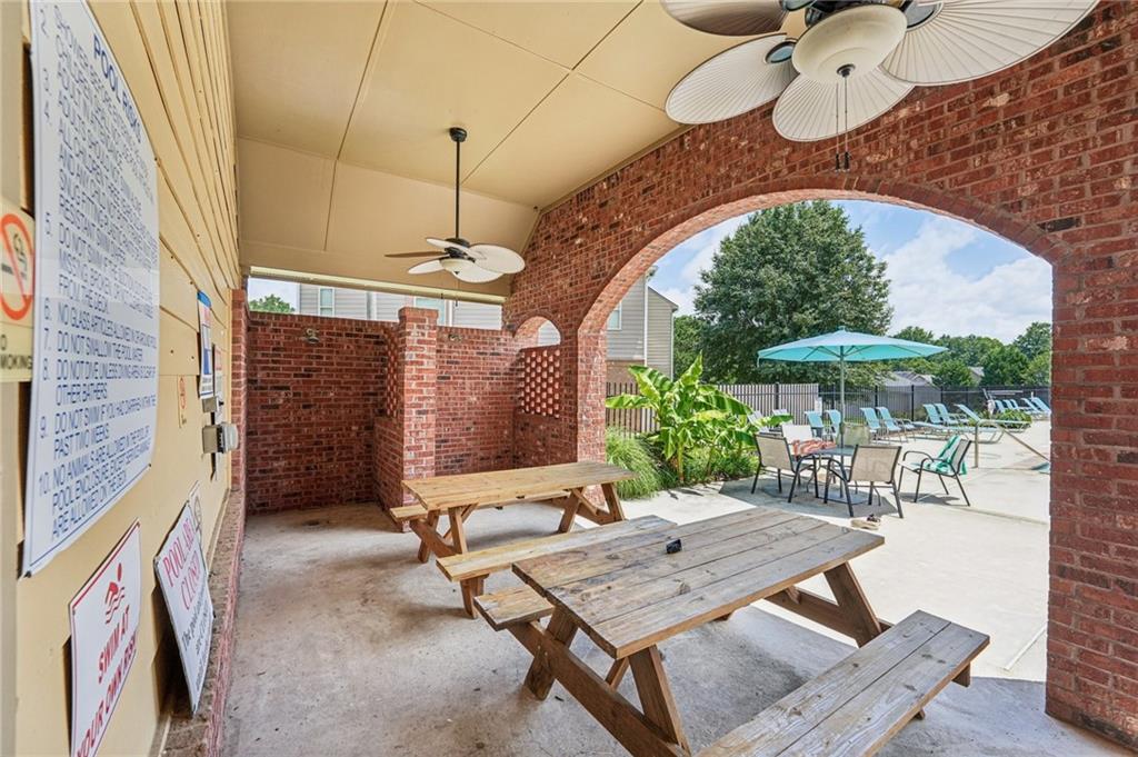 208 Trailside Way Hiram, GA 30141 - Photo 39 of 45 a roof deck with table and chairs