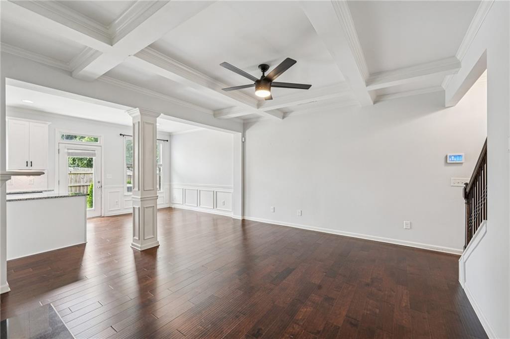 208 Trailside Way Hiram, GA 30141 - Photo 8 of 45 wooden floor in an empty room with a window