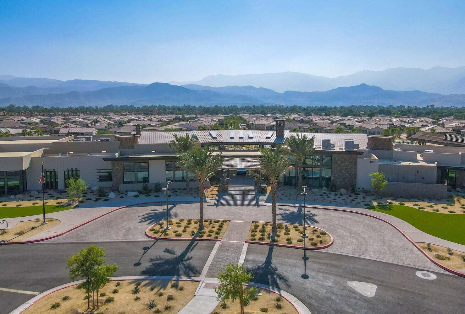 57 Syrah Rancho Mirage, CA 92270 - Photo 32 of 50 an aerial view of a house with swimming pool and mountain view