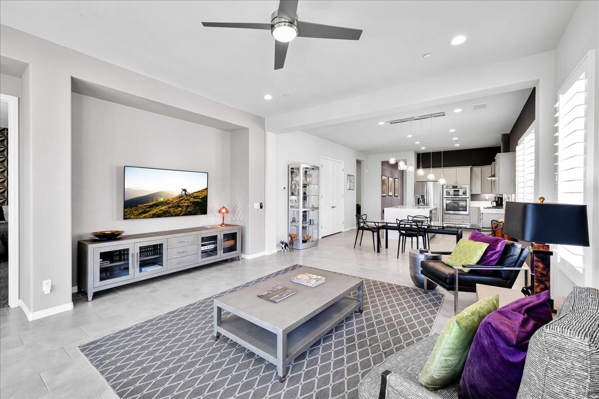 57 Syrah Rancho Mirage, CA 92270 - Photo 5 of 50 a living room with furniture and a flat screen tv