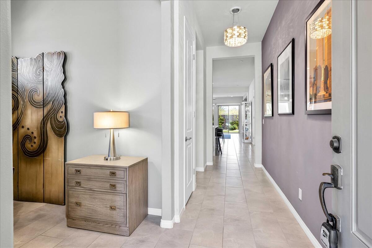 57 Syrah Rancho Mirage, CA 92270 - Photo 10 of 50 a view of a hallway to rooms and stairs