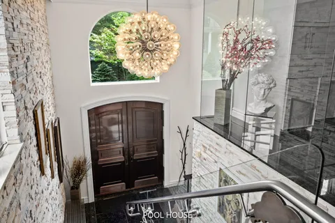 a bathroom with a black white checkered floor