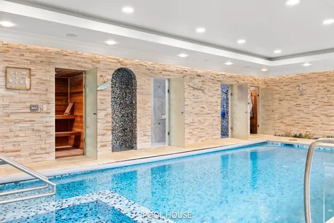 a view of a balcony with wooden floor