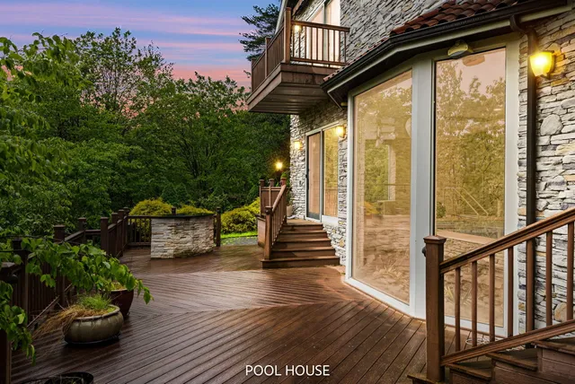 a dining room with furniture a rug and wooden floor