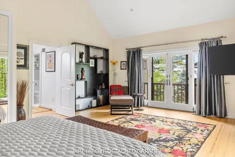 an aerial view of a house with a garden