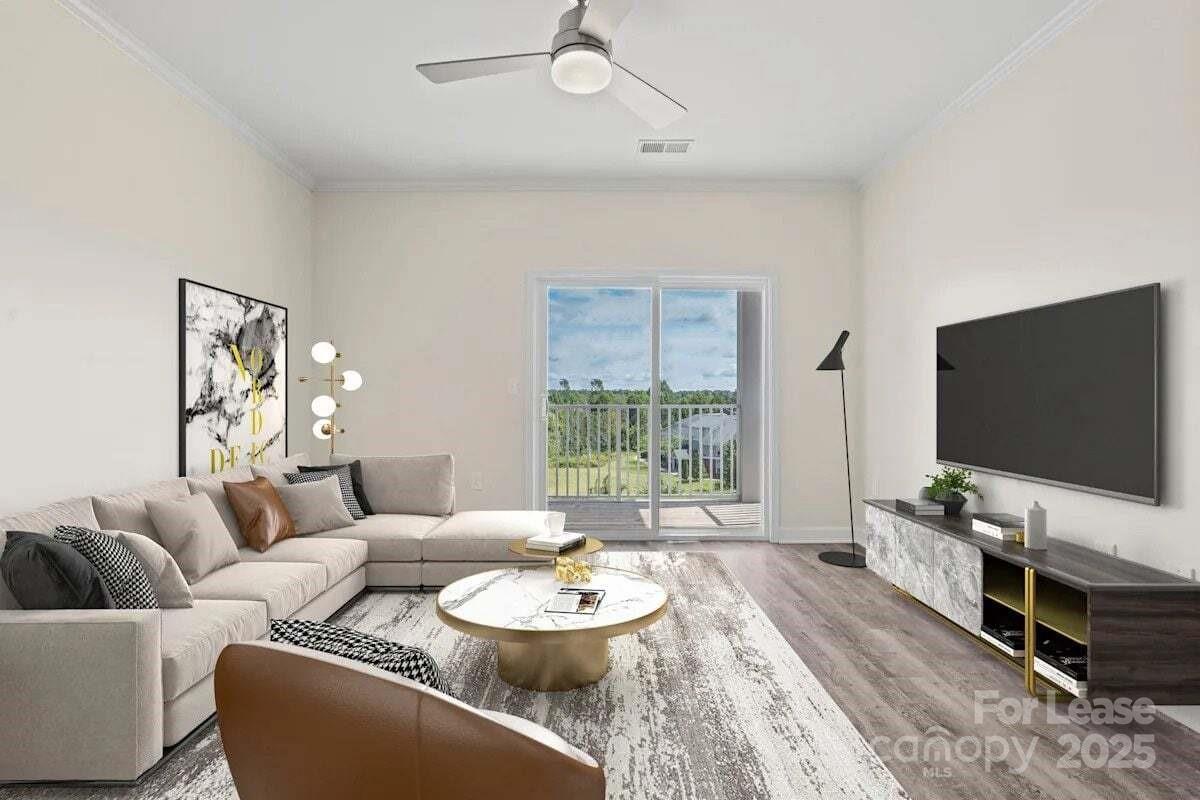 2778 2nd Street Northeast Hickory, NC 28601 - Photo 14 of 20 a living room with furniture and a flat screen tv