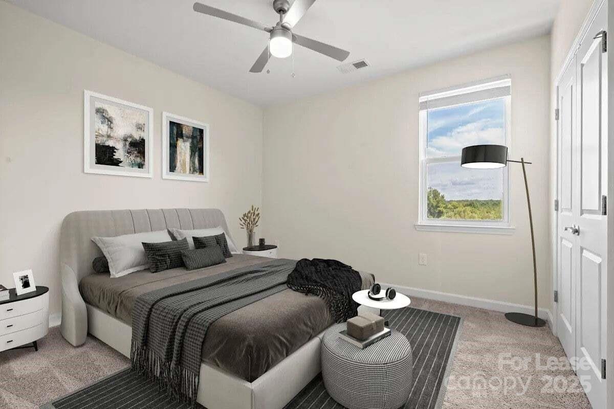 2778 2nd Street Northeast Hickory, NC 28601 - Photo 16 of 20 a bedroom with a bed and a couch