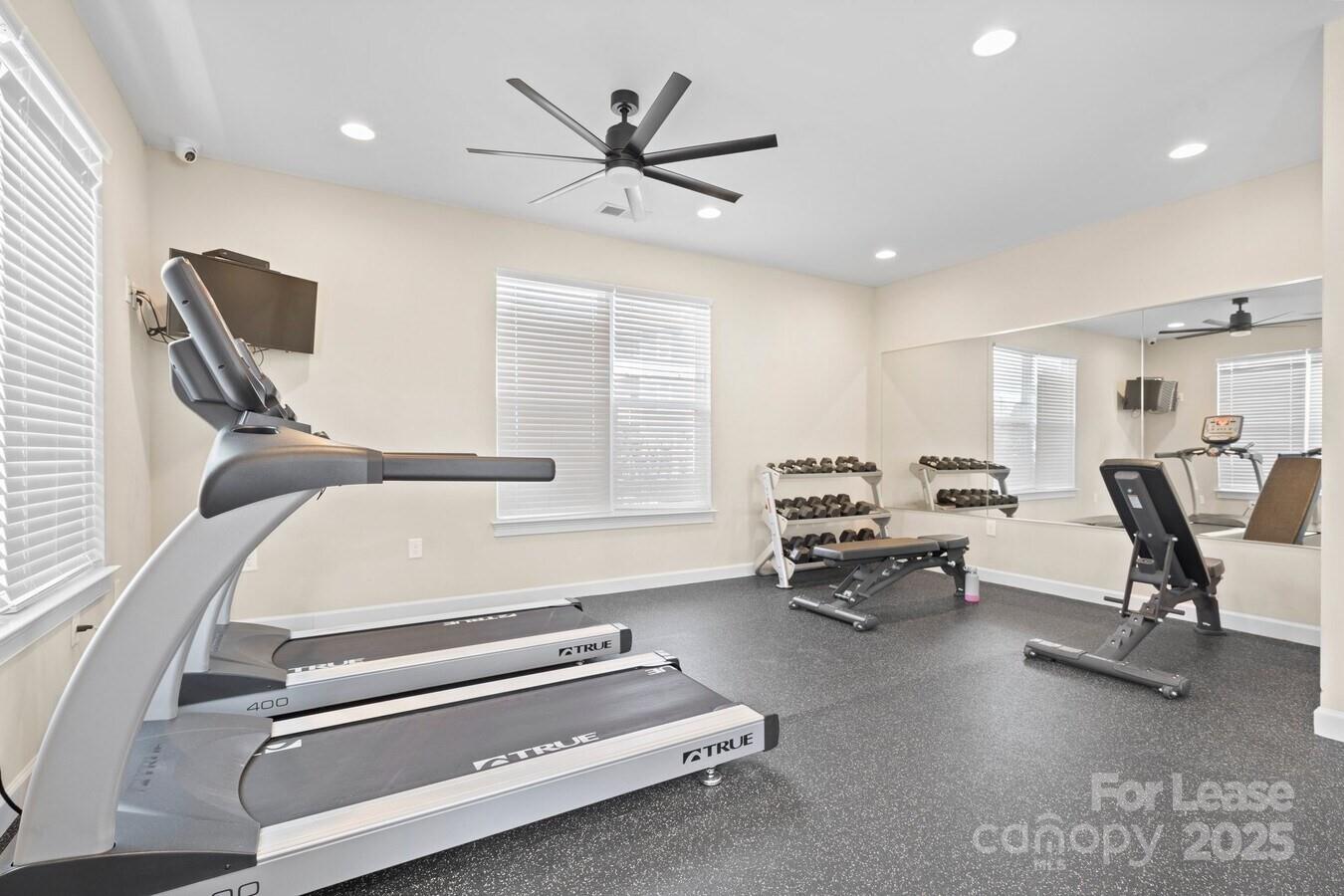 2778 2nd Street Northeast Hickory, NC 28601 - Photo 8 of 20 a living room with furniture gym equipment and a window