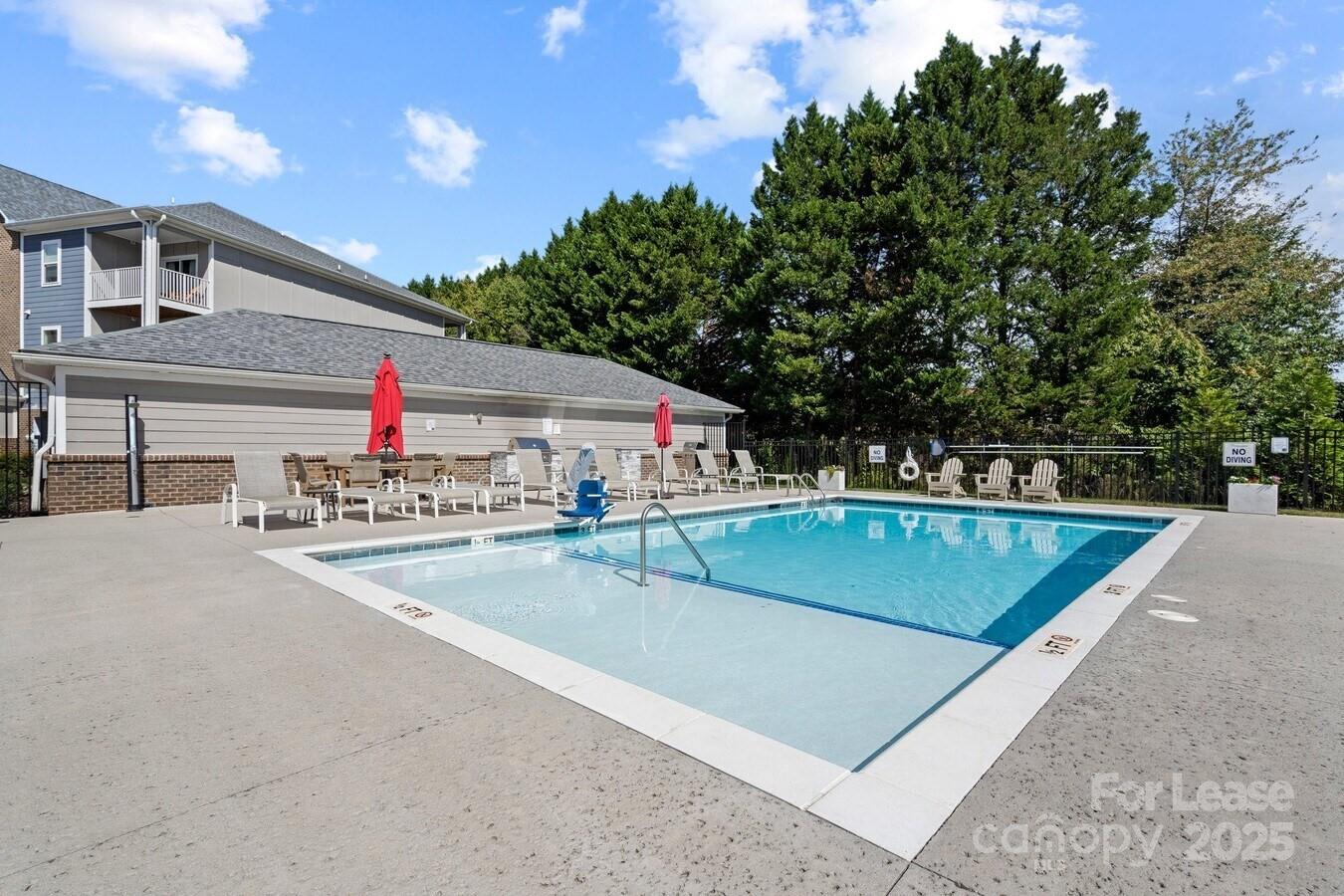 2778 2nd Street Northeast Hickory, NC 28601 - Photo 9 of 20 a view of a pool with a yard