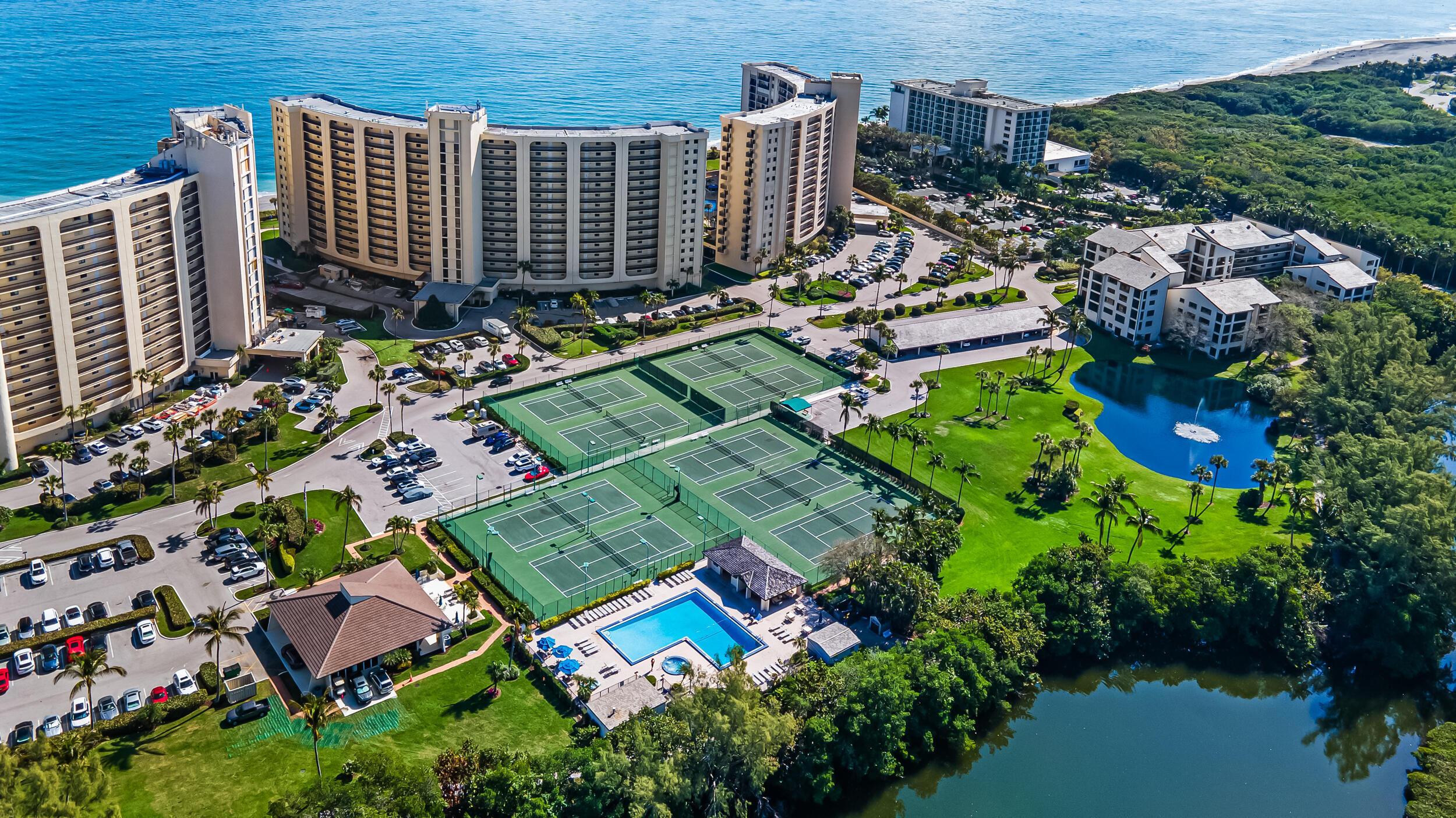 300 Ocean Trail Way, Unit 510 Jupiter, FL 33477 - Photo 40 of 41 Tennis Complex with Heated Pool and Hot