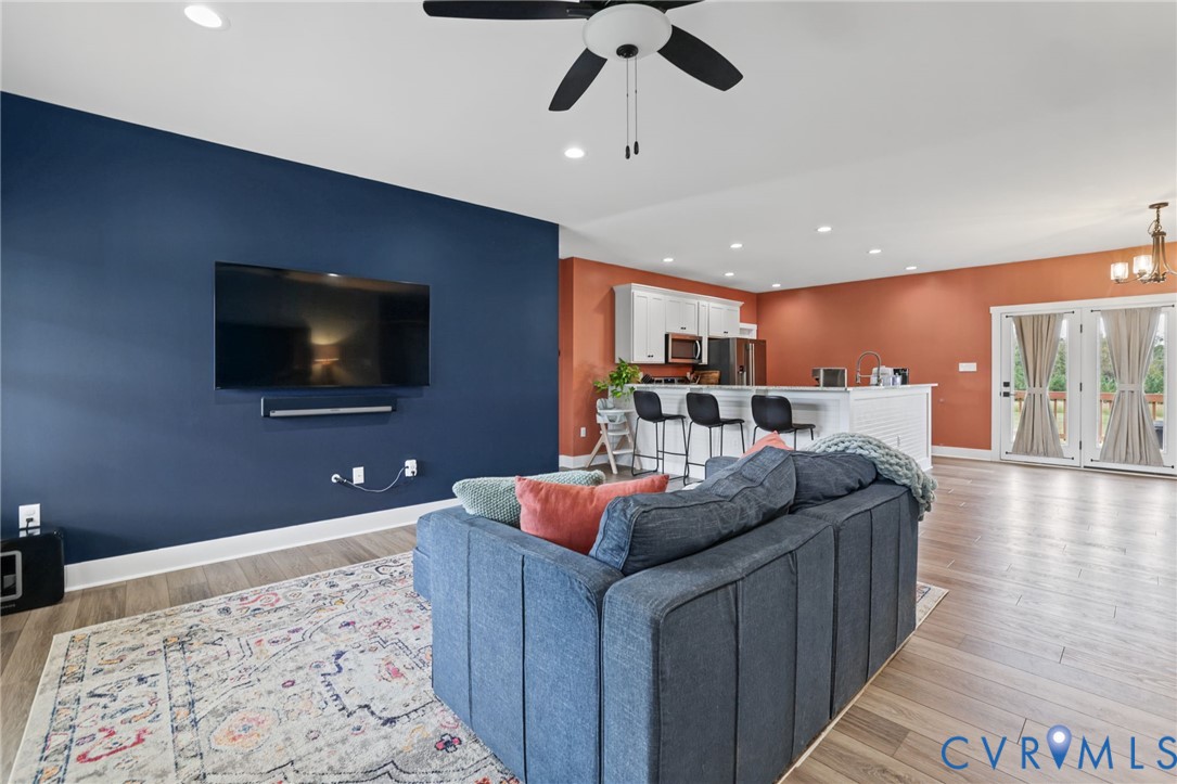 115 Jenkins Church Road Cumberland, VA 23040 - Photo 4 of 28 Open-concept living area featuring wood-finish flo