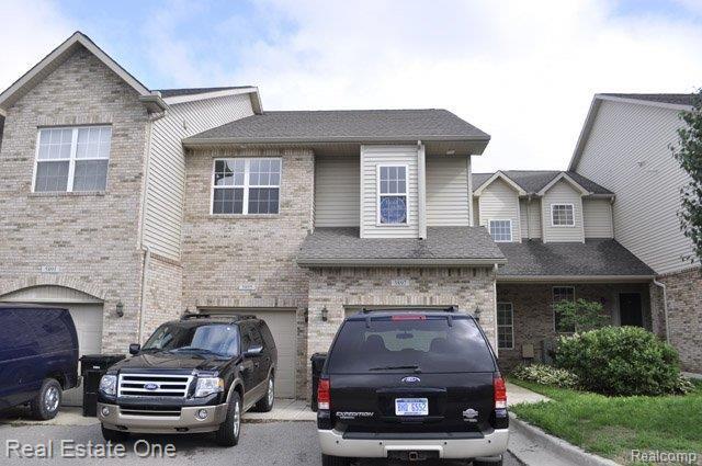 5897 High Point Court, Unit 9 Brighton, MI 48116 - Photo 2 of 22 Front alt view