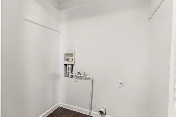 a bathroom with a sink and vanity