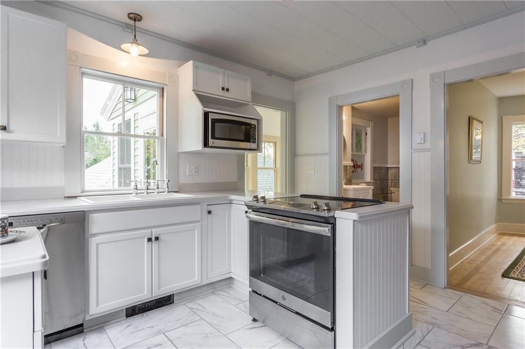 53 Long Sands Road York, ME 03909 - Photo 7 of 34 This view of the kitchen shows the...