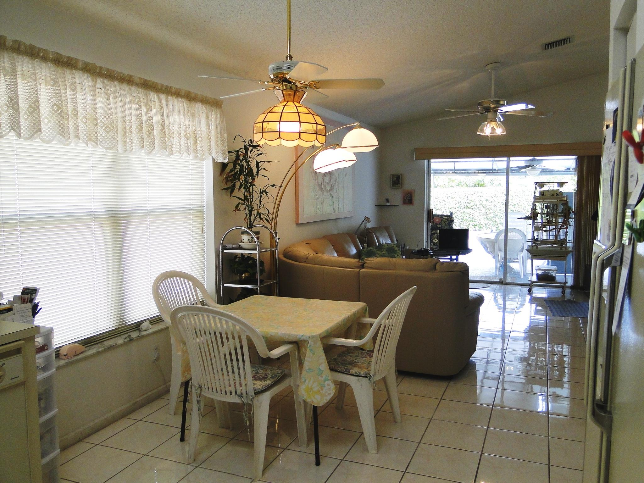 9473 Baritone Court Boca Raton, FL 33496 - Photo 11 of 19 BREAKFAST AREA AND FAMILY ROOM