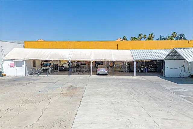 an aerial view of a yard with table and chairs