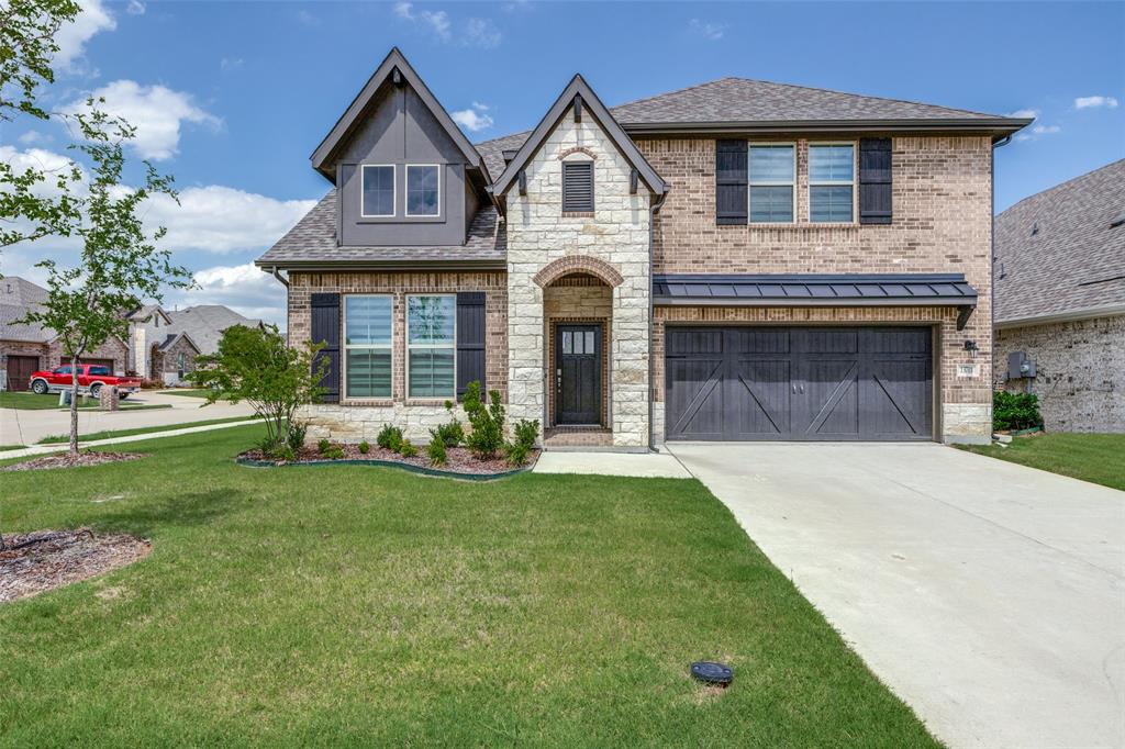 13701 Riola Drive Little Elm, TX 75068 - Photo 1 of 1 a front view of a house with a yard