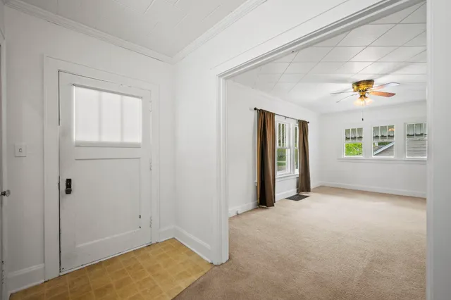 an empty room with windows