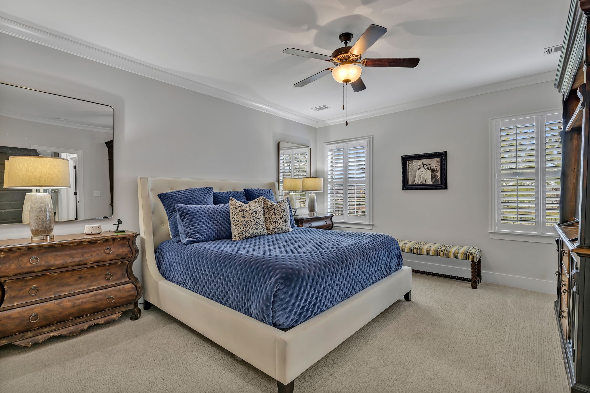 4049 Ryecroft Lane Franklin, TN 37064 - Photo 13 of 34 a spacious bedroom with a bed and a chandelier