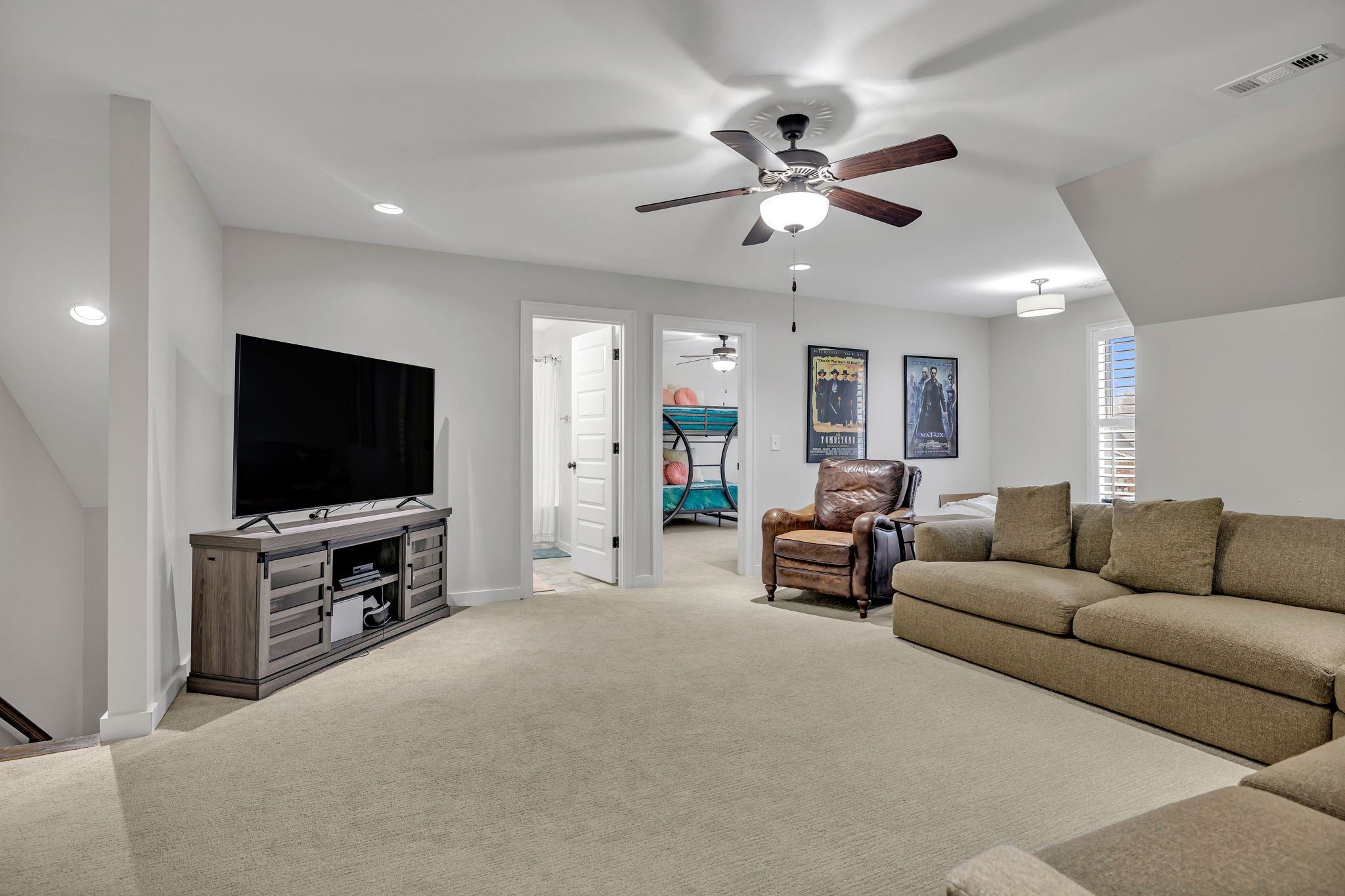 4049 Ryecroft Lane Franklin, TN 37064 - Photo 16 of 34 a living room with furniture and a flat screen tv