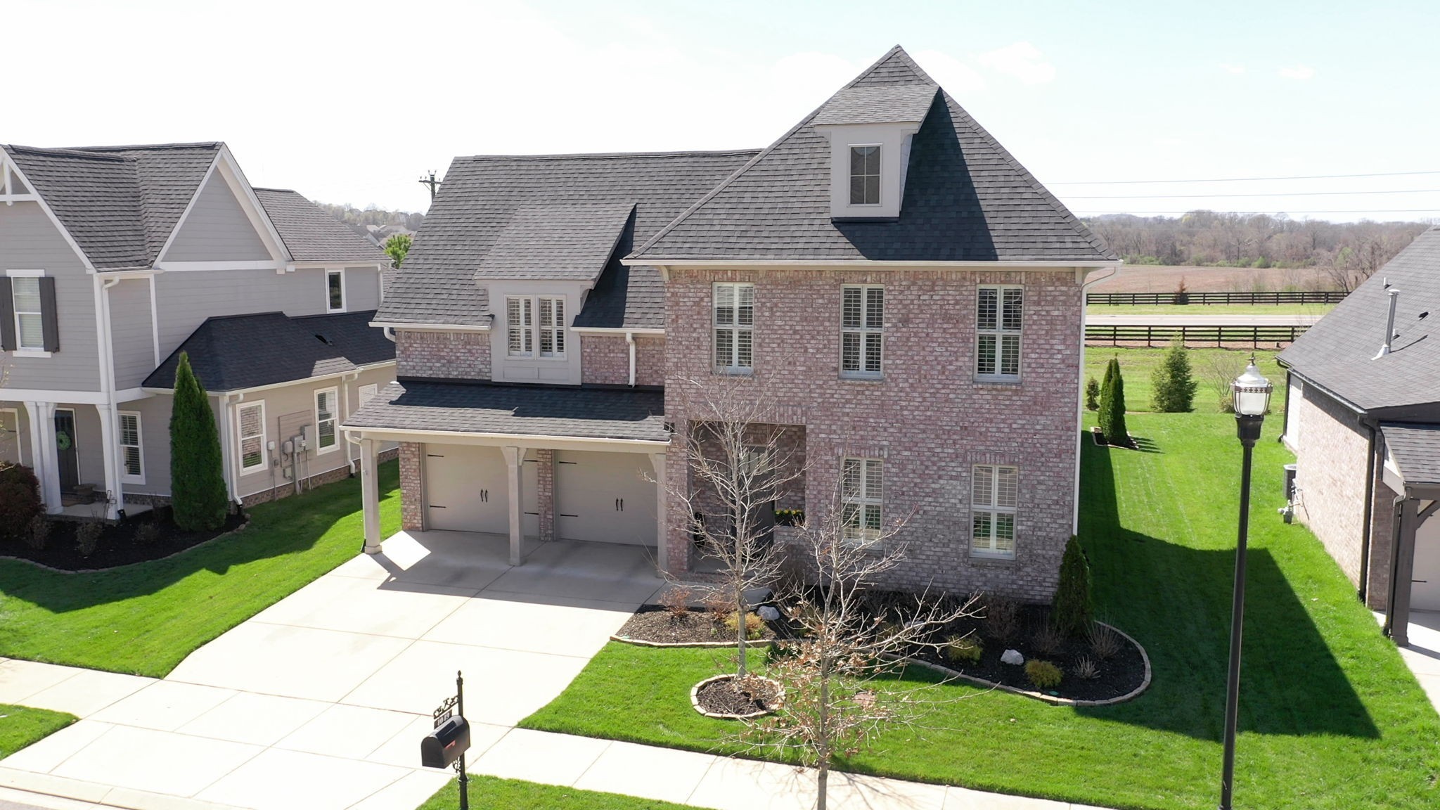 4049 Ryecroft Lane Franklin, TN 37064 - Photo 2 of 34 a aerial view of a house with garden