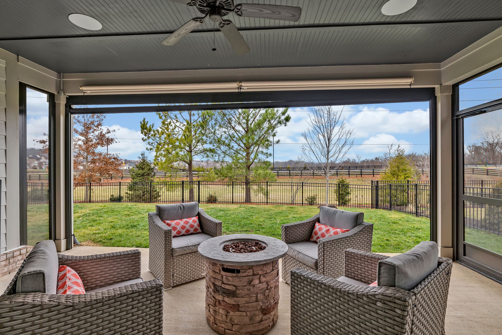 4049 Ryecroft Lane Franklin, TN 37064 - Photo 22 of 34 a living room with patio furniture and a floor to ceiling window