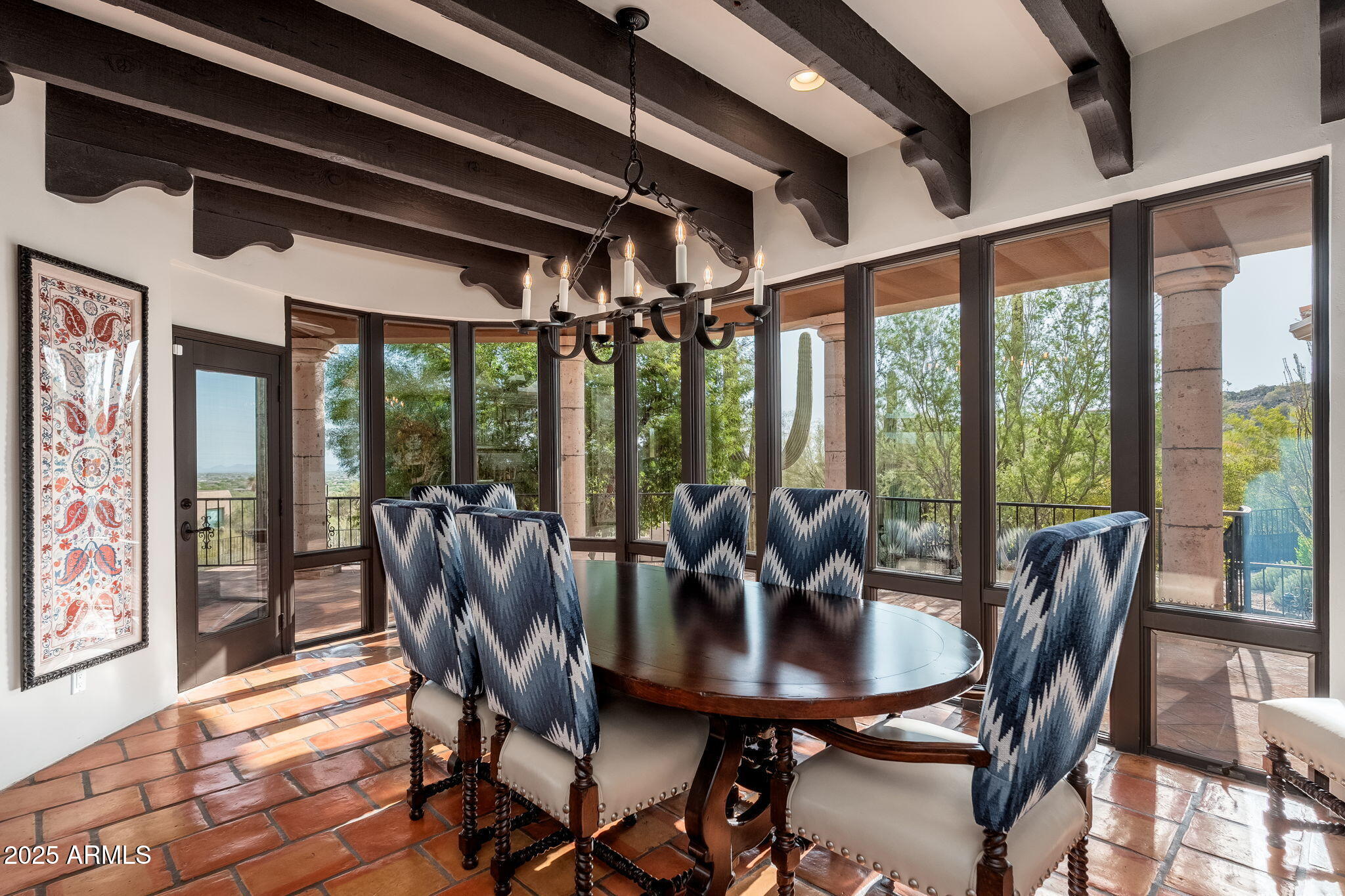 6527 East El Sendero Road Carefree, AZ 85377 - Photo 17 of 93 a view of a dining room with furniture window and wooden floor
