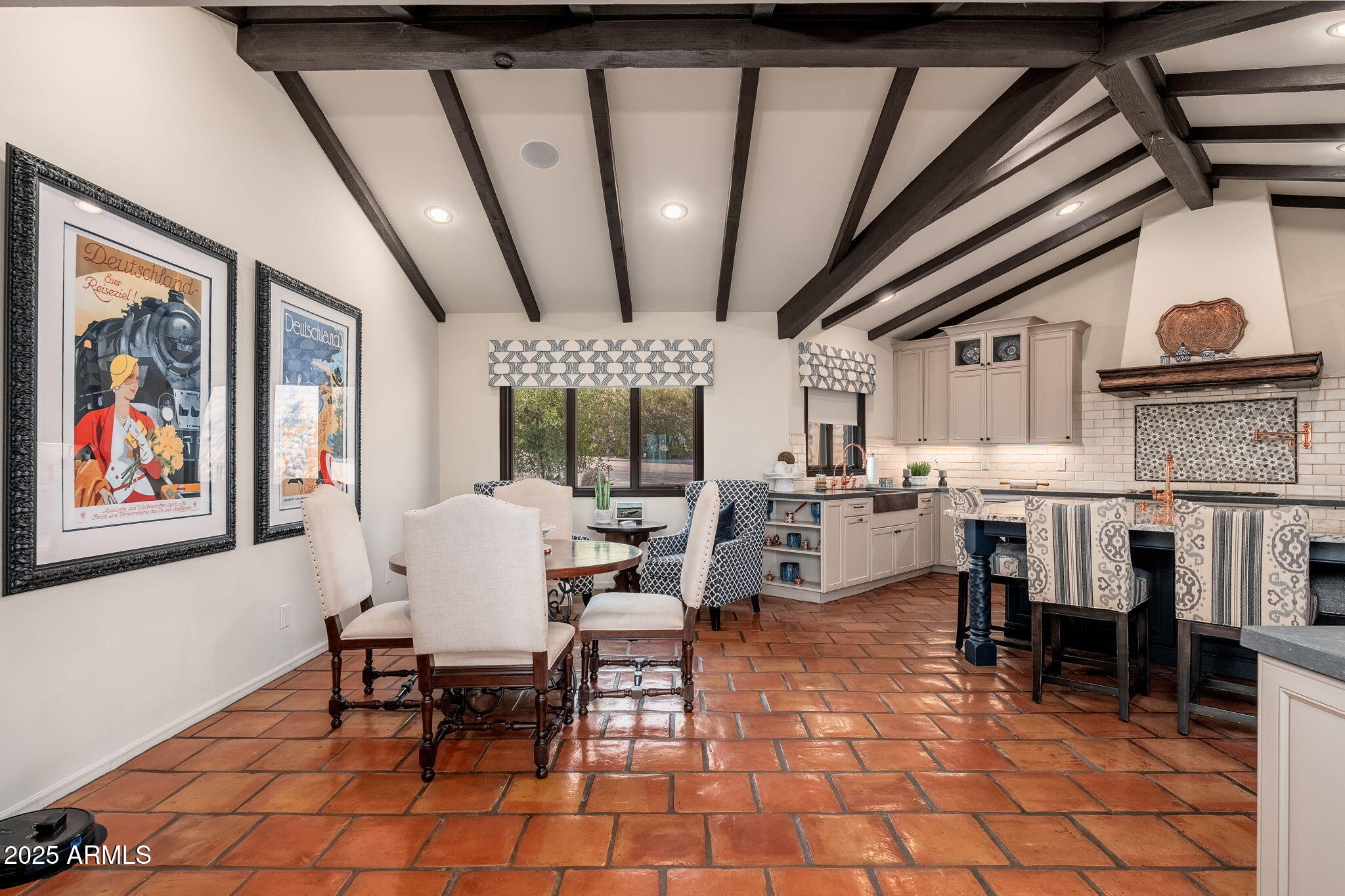 6527 East El Sendero Road Carefree, AZ 85377 - Photo 22 of 93 a view of a dining area with furniture window and wooden floor