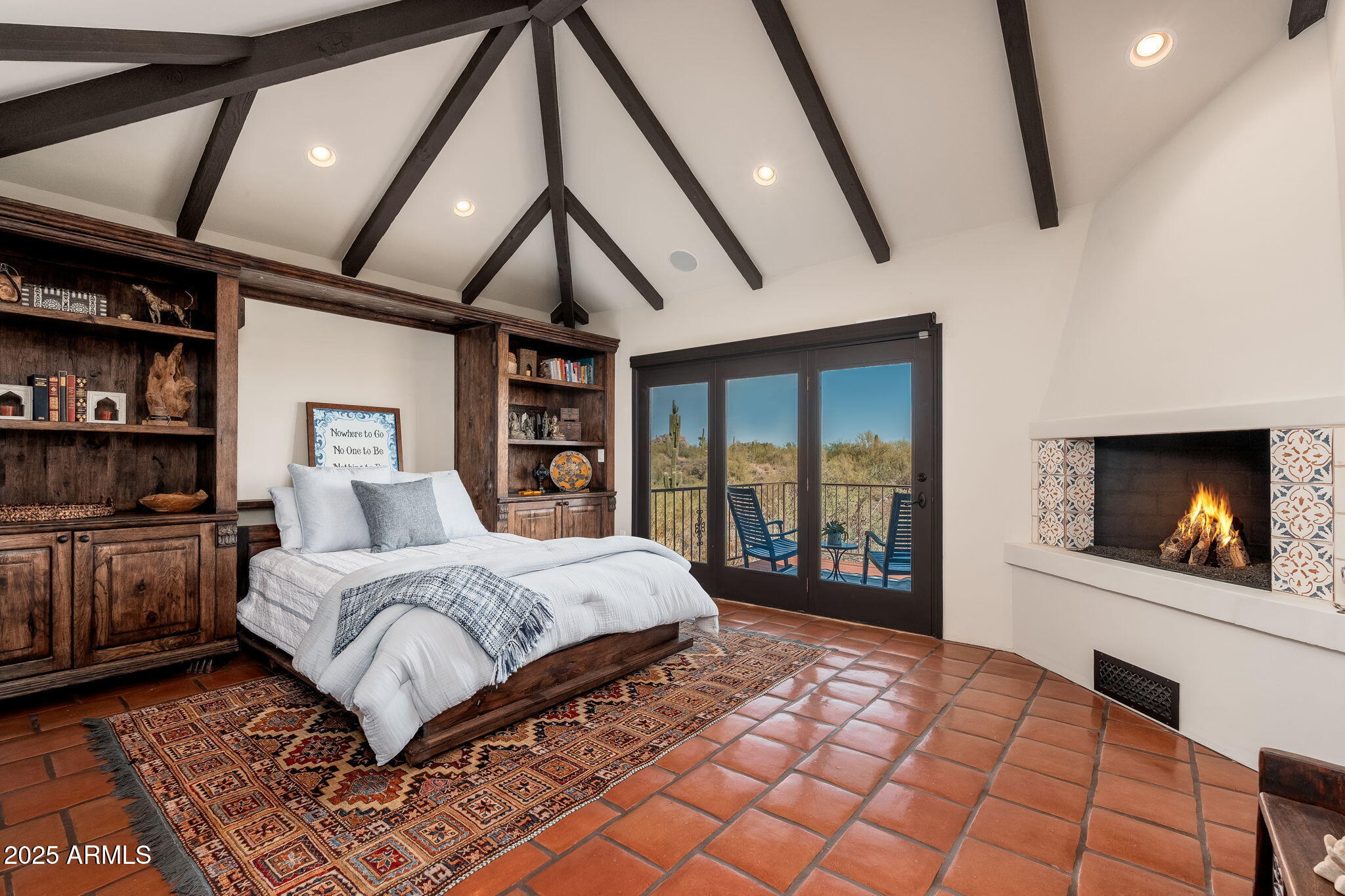 6527 East El Sendero Road Carefree, AZ 85377 - Photo 38 of 93 a spacious bedroom with a large bed and a flat tv screen