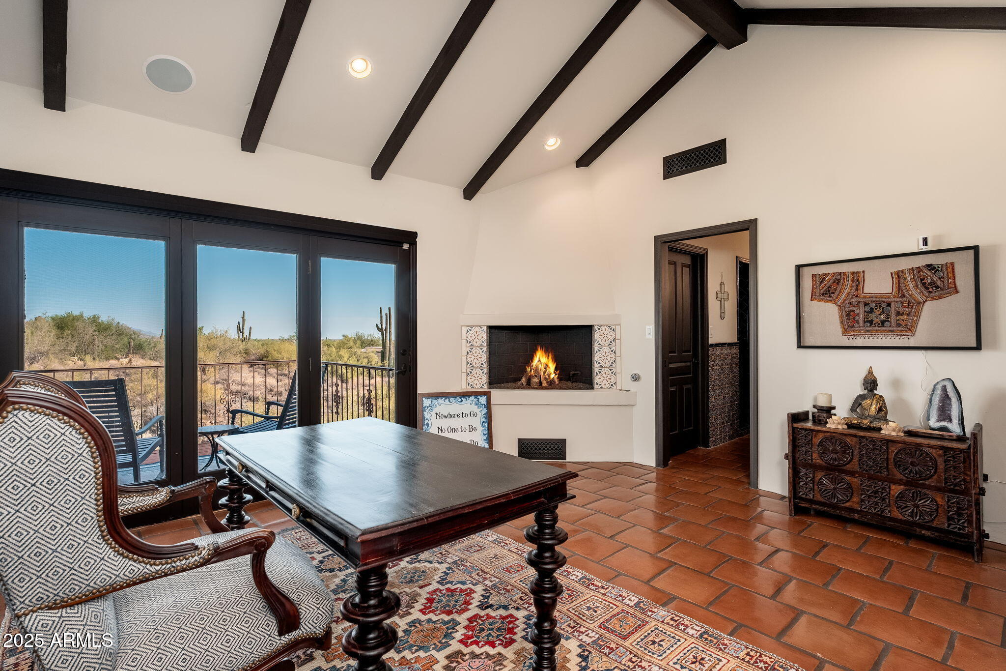 6527 East El Sendero Road Carefree, AZ 85377 - Photo 42 of 93 a living room with furniture and a flat screen tv