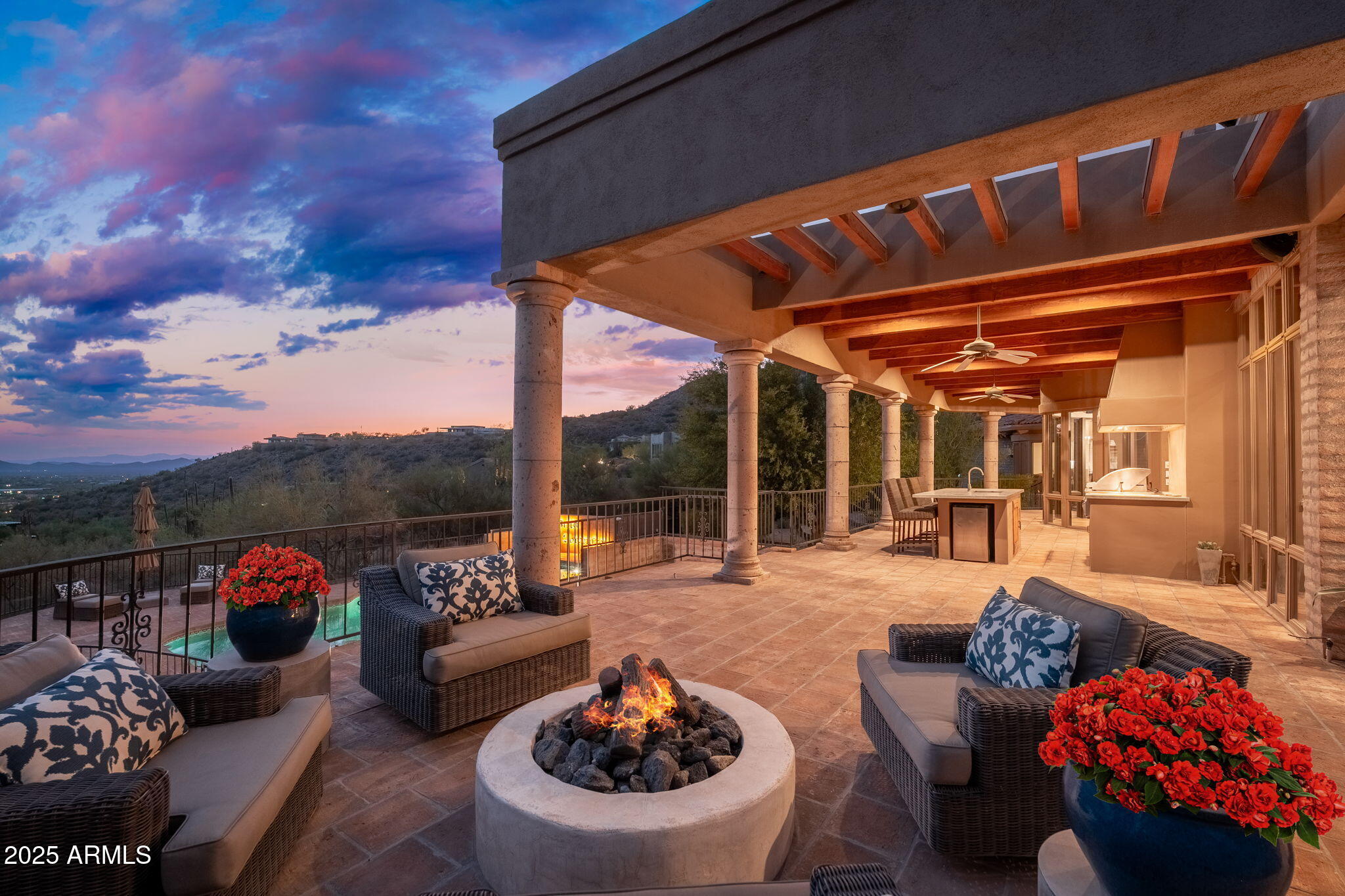 6527 East El Sendero Road Carefree, AZ 85377 - Photo 53 of 93 a outdoor space with patio couches and a fireplace