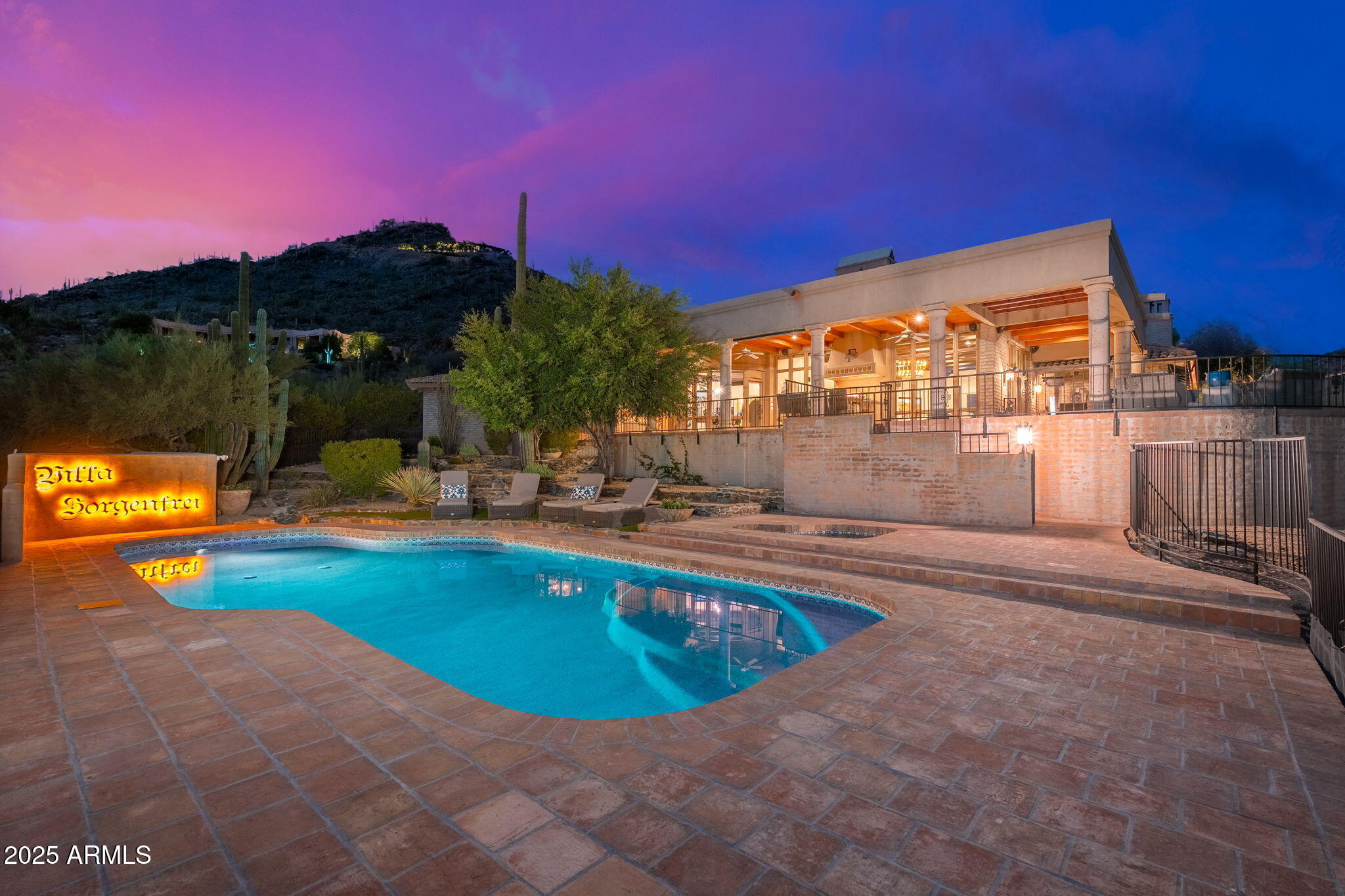 6527 East El Sendero Road Carefree, AZ 85377 - Photo 66 of 93 a view of a swimming pool with a patio