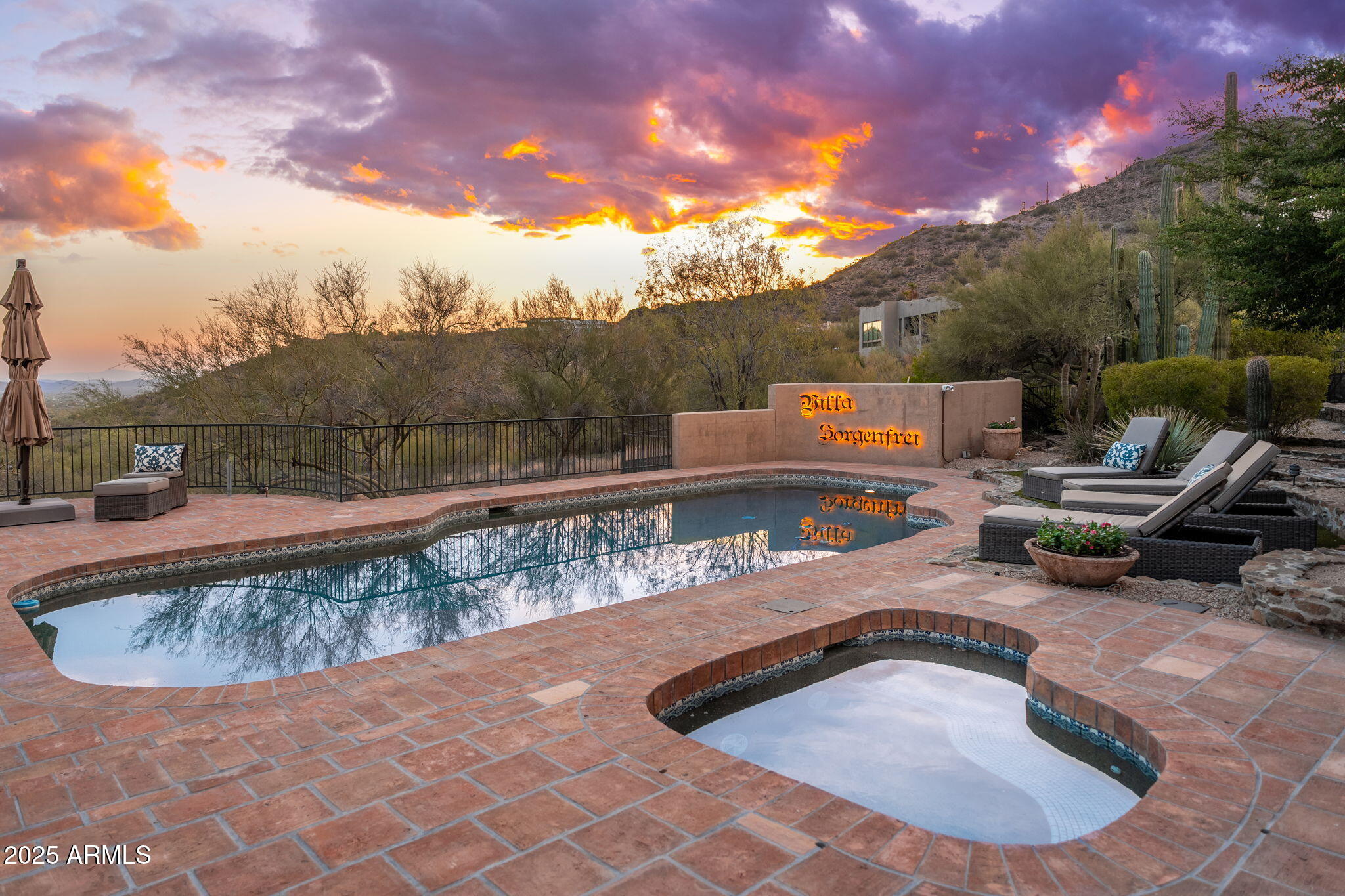6527 East El Sendero Road Carefree, AZ 85377 - Photo 70 of 93 a view of a swimming pool with a patio