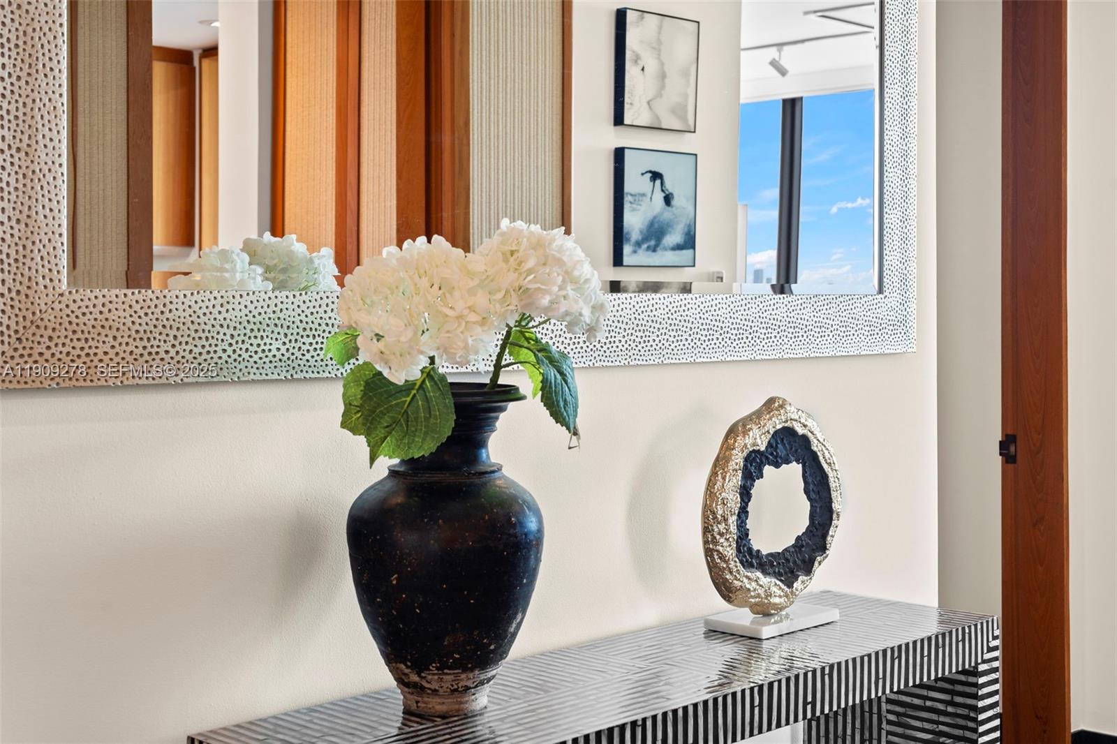 101 20th Street, Unit 3202 Miami Beach, FL 33139 - Photo 24 of 54 a vase of flowers sitting on a table