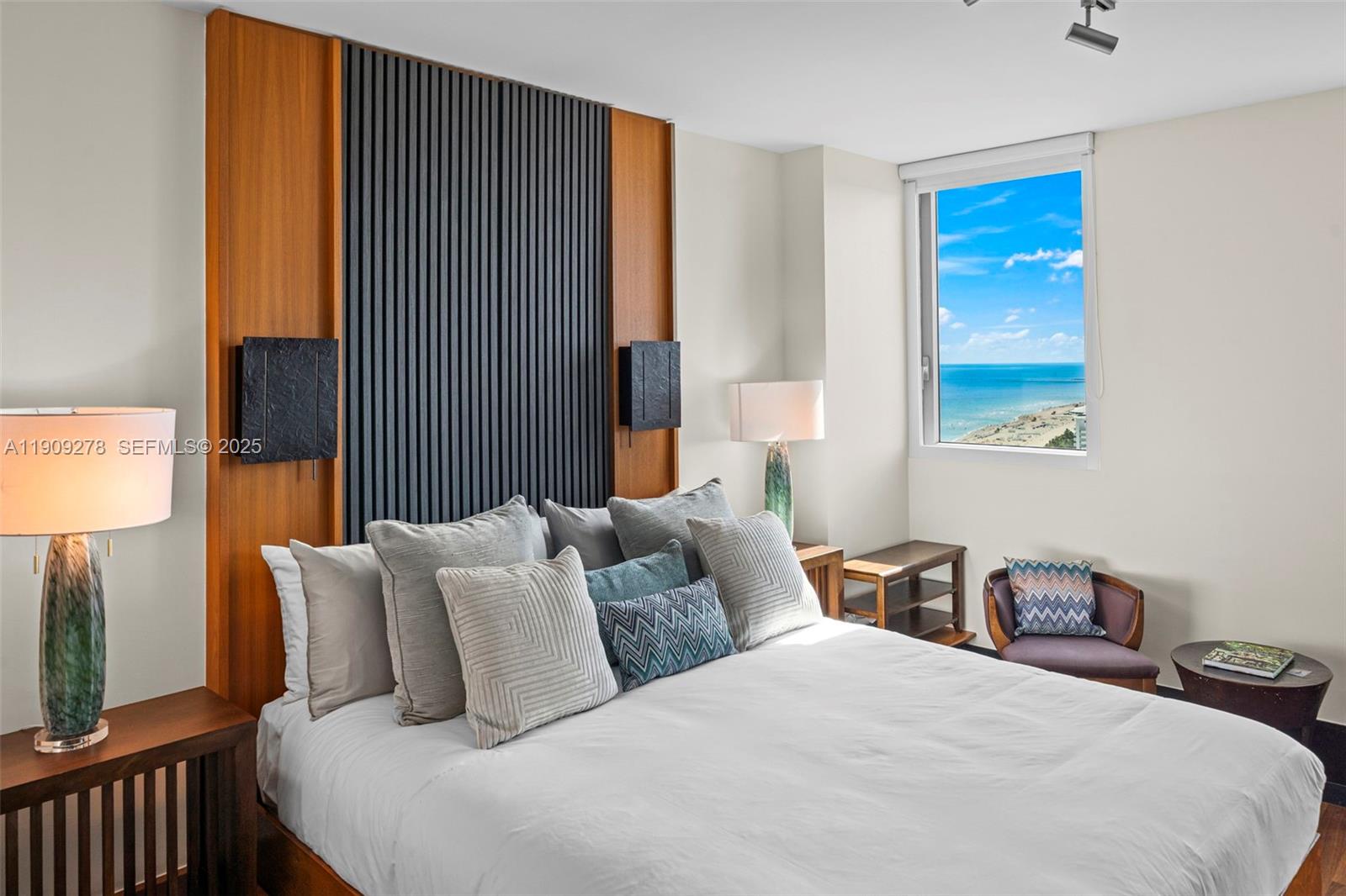 101 20th Street, Unit 3202 Miami Beach, FL 33139 - Photo 26 of 54 a bedroom with bed and window