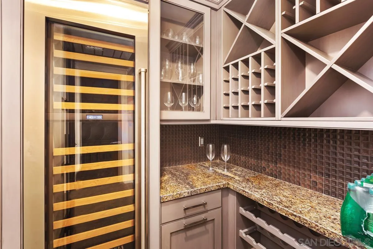 8330 Artesian Road San Diego, CA 92127 - Photo 13 of 26 a kitchen with a sink and cabinets