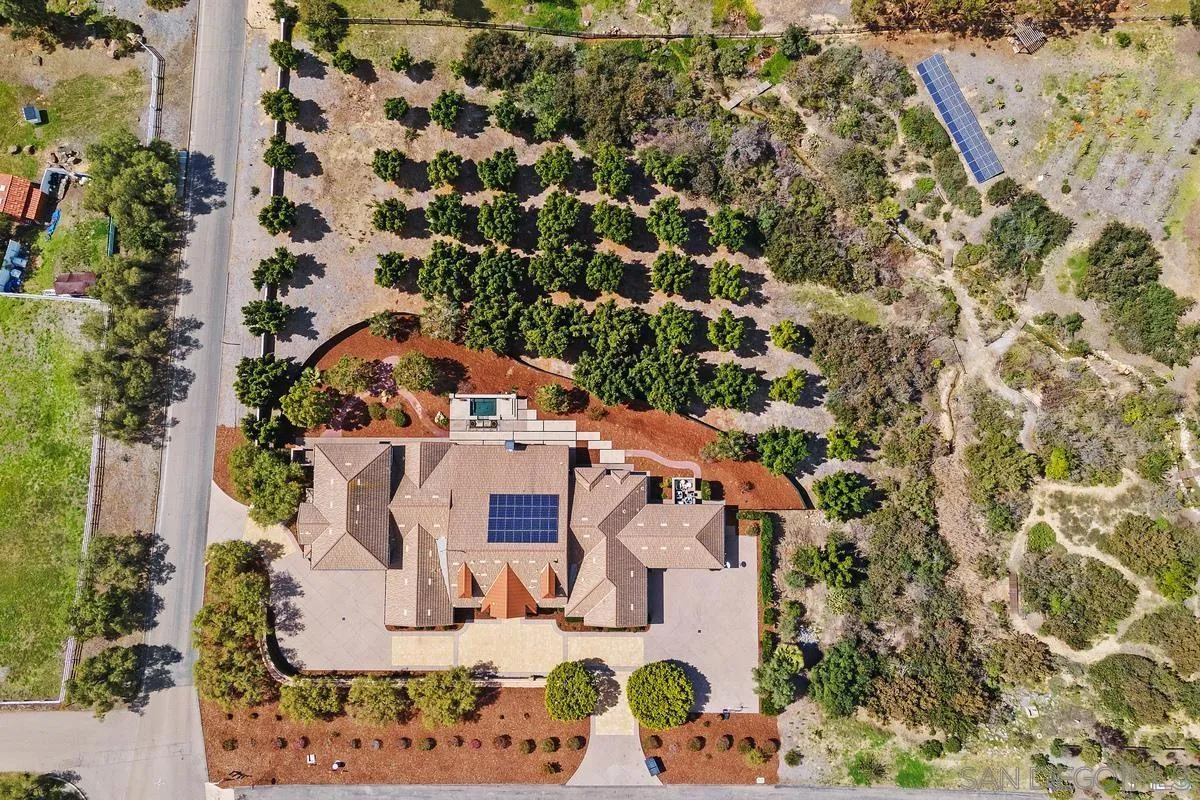 8330 Artesian Road San Diego, CA 92127 - Photo 23 of 26 an aerial view of a house with a yard