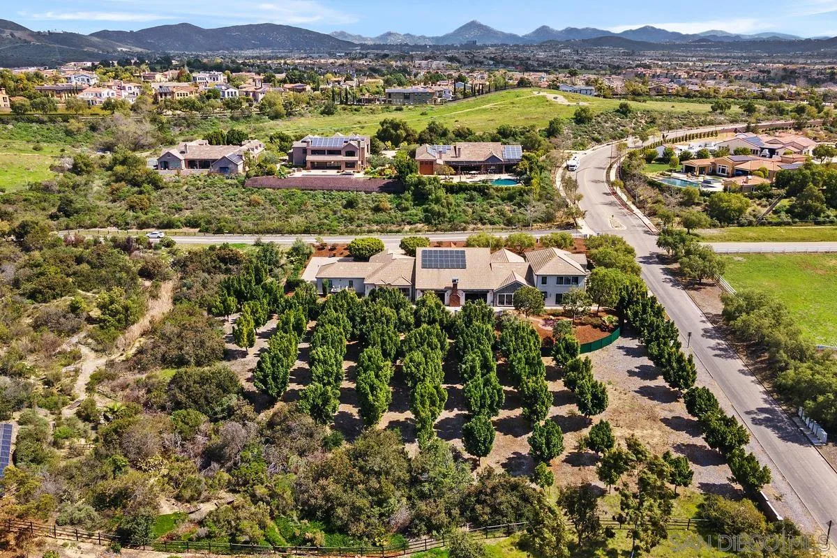 8330 Artesian Road San Diego, CA 92127 - Photo 24 of 26 an aerial view of residential houses with outdoor space and trees