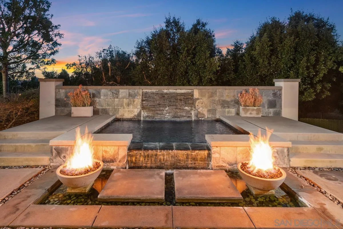 8330 Artesian Road San Diego, CA 92127 - Photo 4 of 26 a view of a patio with couches and potted plants